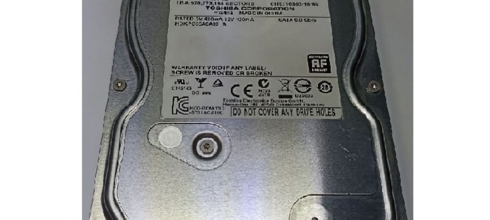 После скачка напряжения Toshiba DT01ACA050